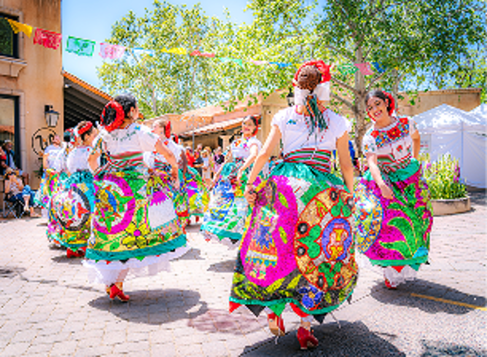 Folklorico dancers performing in the courtyard